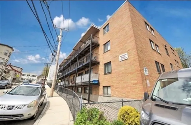 a view of a street with a cars