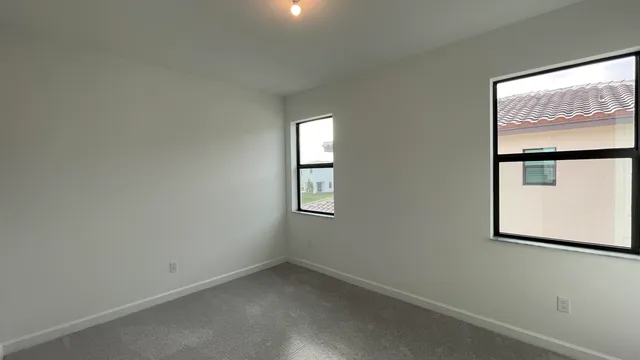 an empty room with windows