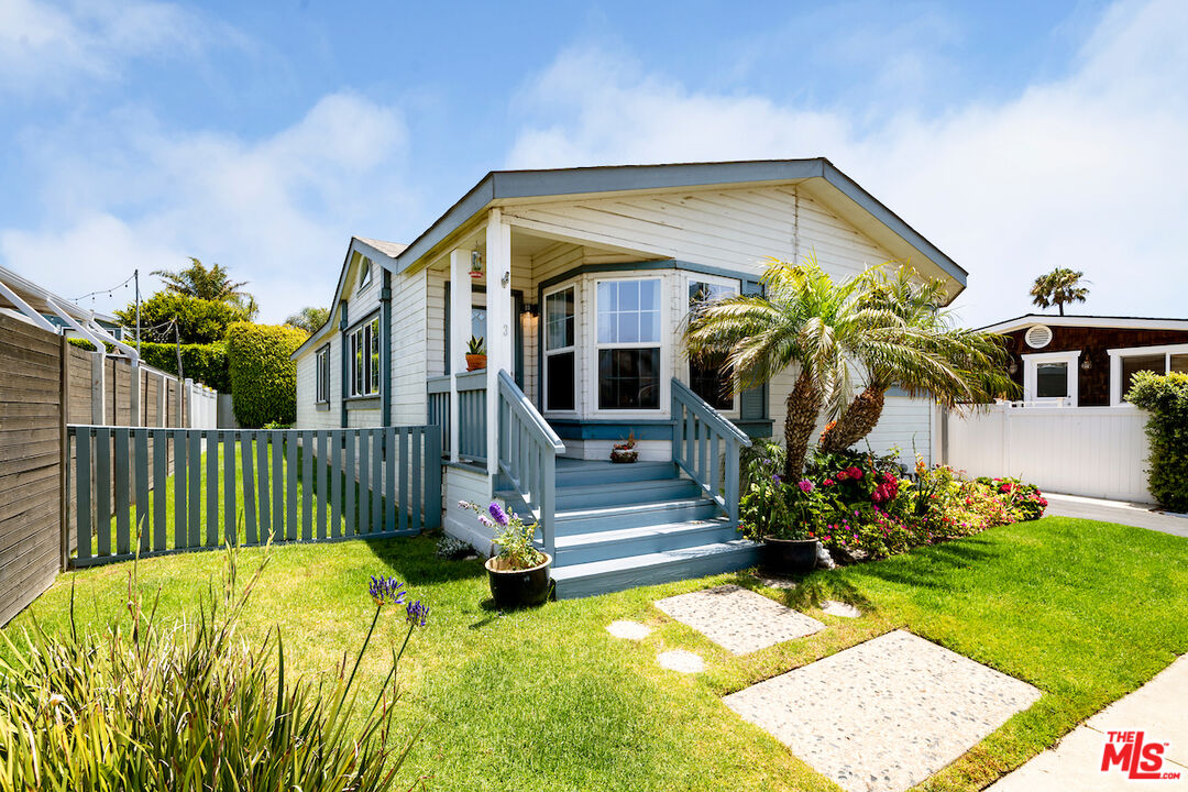 29500 Heathercliff Road, Unit 3 Malibu, CA 90265 - Photo 1 of 18 a front view of a house with swimming pool
