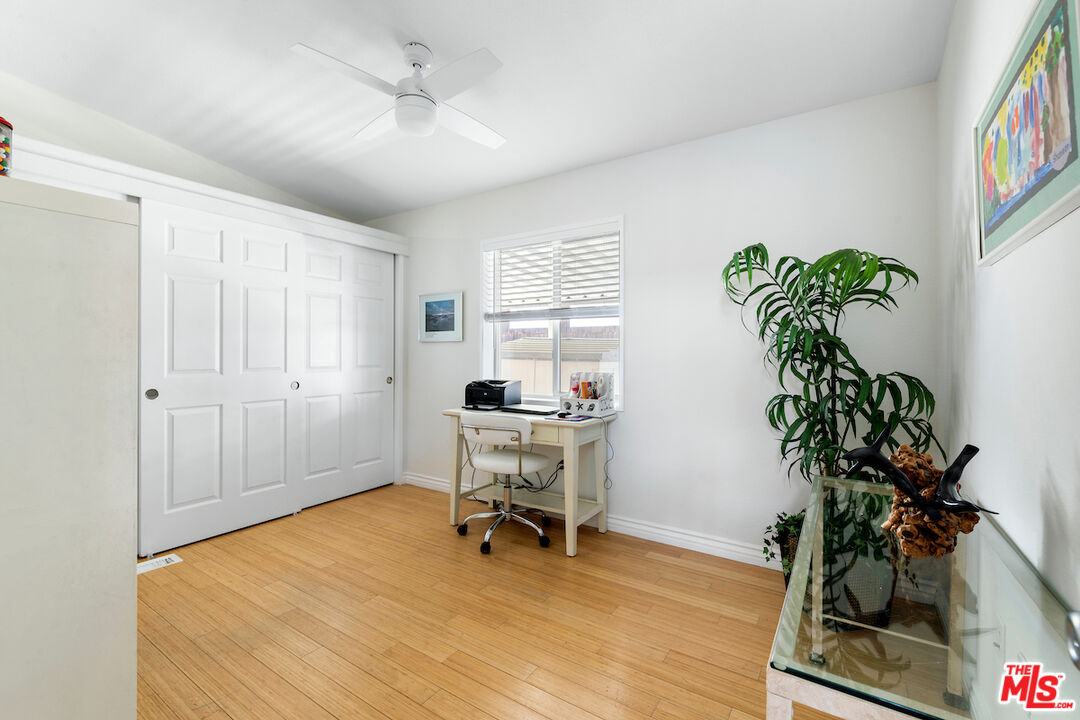 29500 Heathercliff Road, Unit 3 Malibu, CA 90265 - Photo 12 of 18 a workspace with furniture and a potted plant