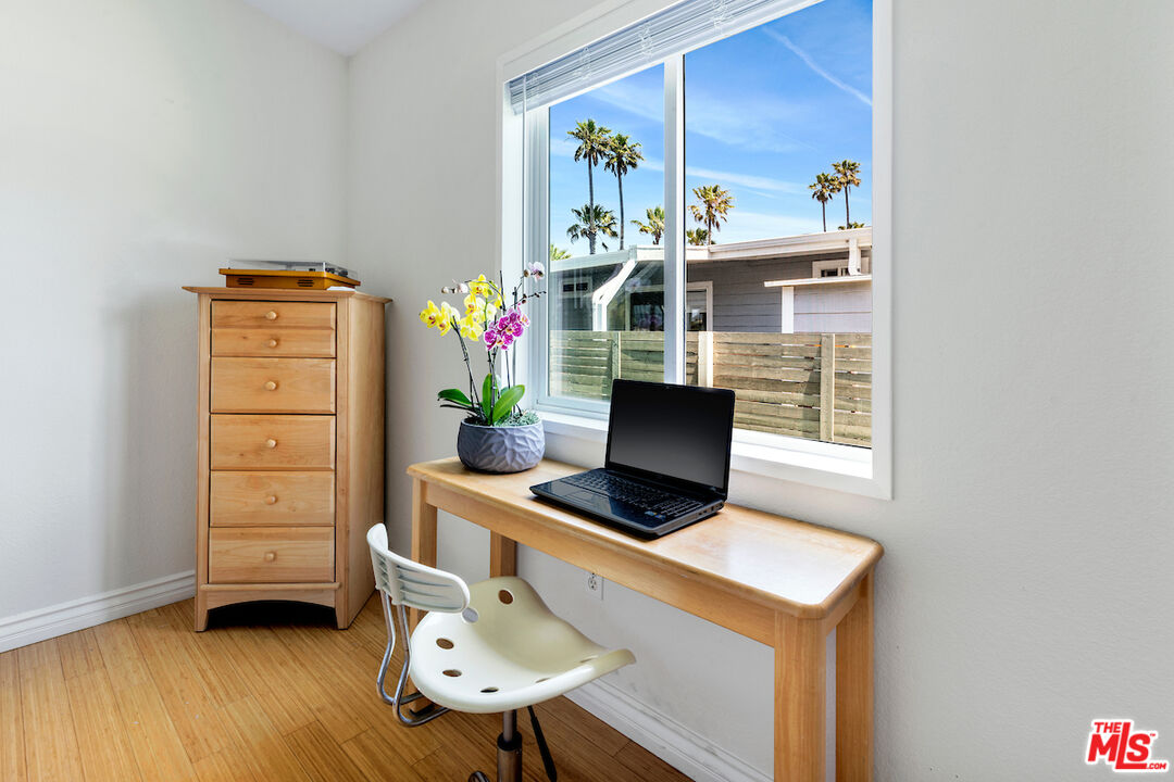 29500 Heathercliff Road, Unit 3 Malibu, CA 90265 - Photo 14 of 18 a living room with furniture and a table