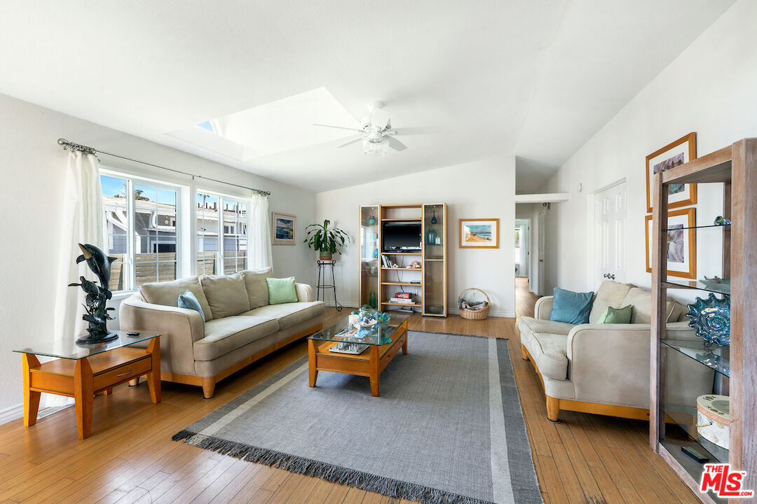 29500 Heathercliff Road, Unit 3 Malibu, CA 90265 - Photo 7 of 18 a living room with furniture and a fireplace