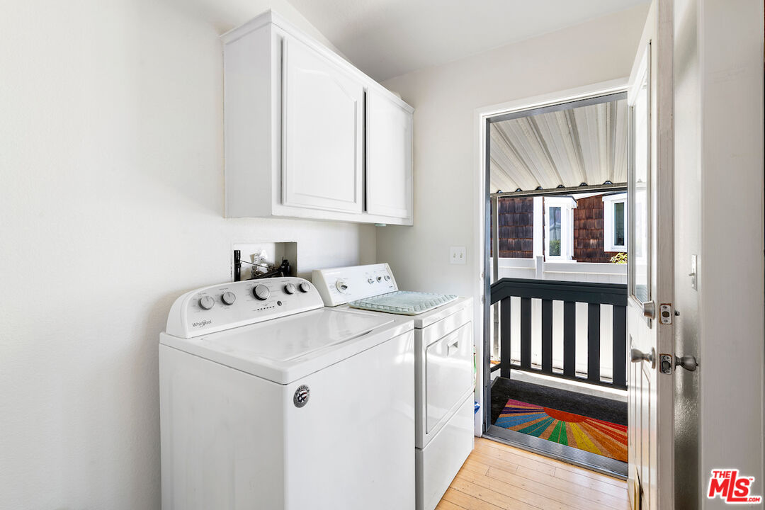 29500 Heathercliff Road, Unit 3 Malibu, CA 90265 - Photo 10 of 18 a utility room with dryer and washer