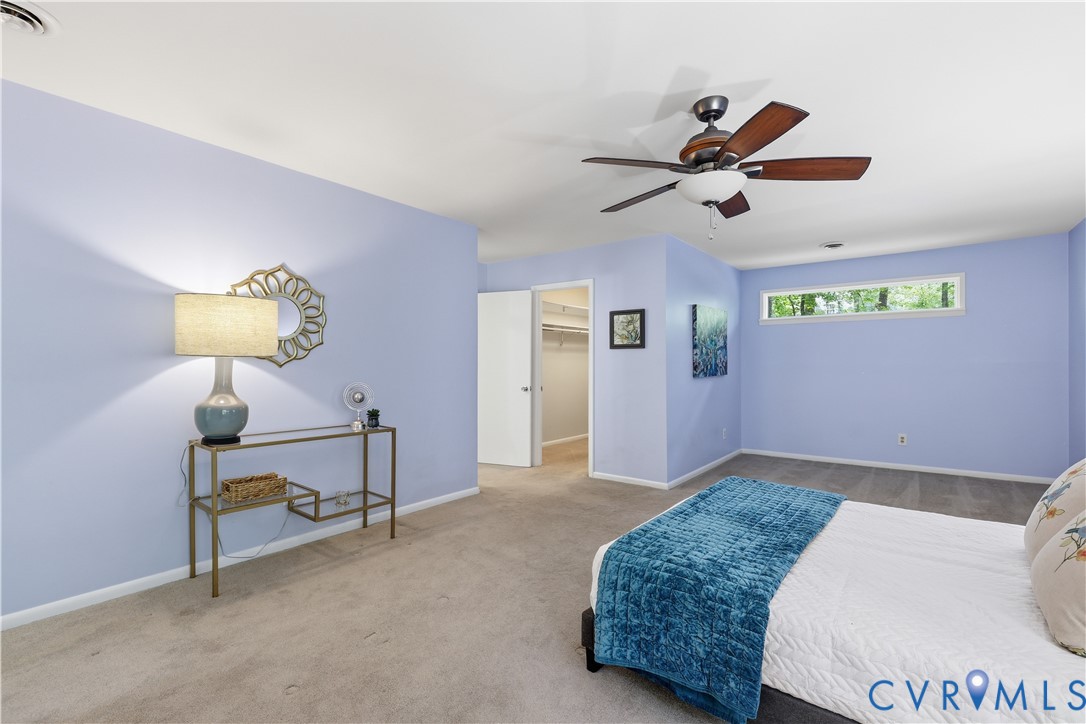 13622 Winterberry Ridge Midlothian, VA 23112 - Photo 20 of 47 a bedroom with a bed and a lamp on table