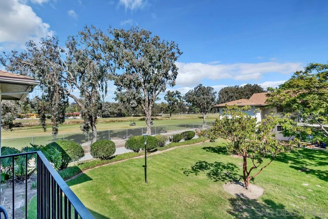 4095 Bonita Road, Unit 218 Bonita, CA 91902 - Photo 15 of 33 a view of a lake with a yard
