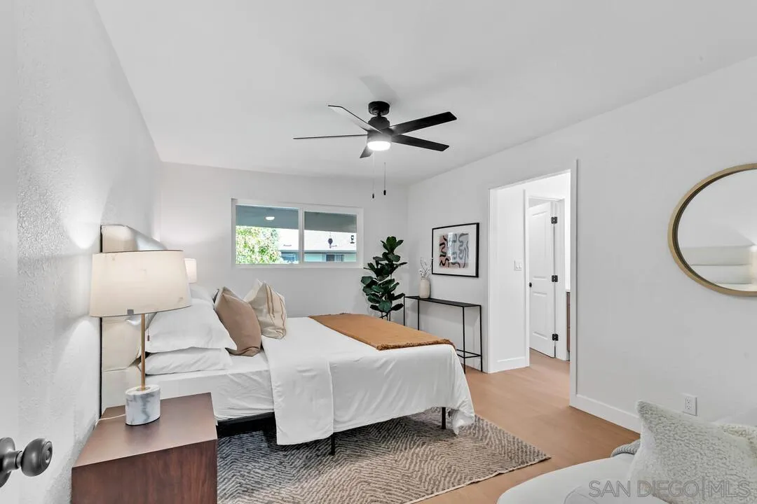 4095 Bonita Road, Unit 218 Bonita, CA 91902 - Photo 16 of 33 a bedroom with a bed and window