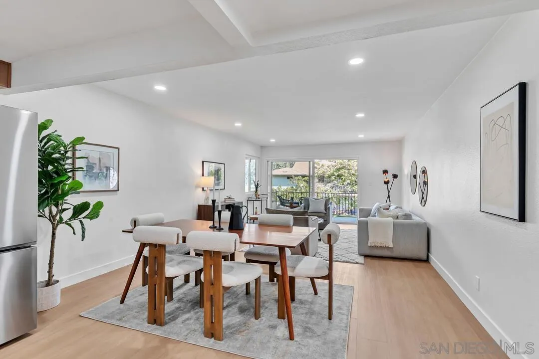4095 Bonita Road, Unit 218 Bonita, CA 91902 - Photo 9 of 33 a view of a dining room with furniture window and wooden floor