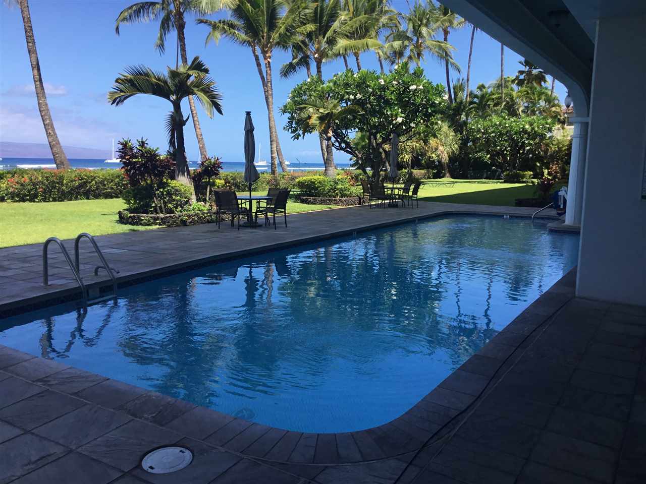475 Front Street, Unit 624 Lahaina, HI 96761 - Photo 12 of 17 a view of a swimming pool with a yard