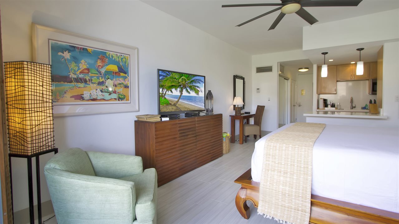 475 Front Street, Unit 624 Lahaina, HI 96761 - Photo 2 of 17 a living room with furniture and a large window