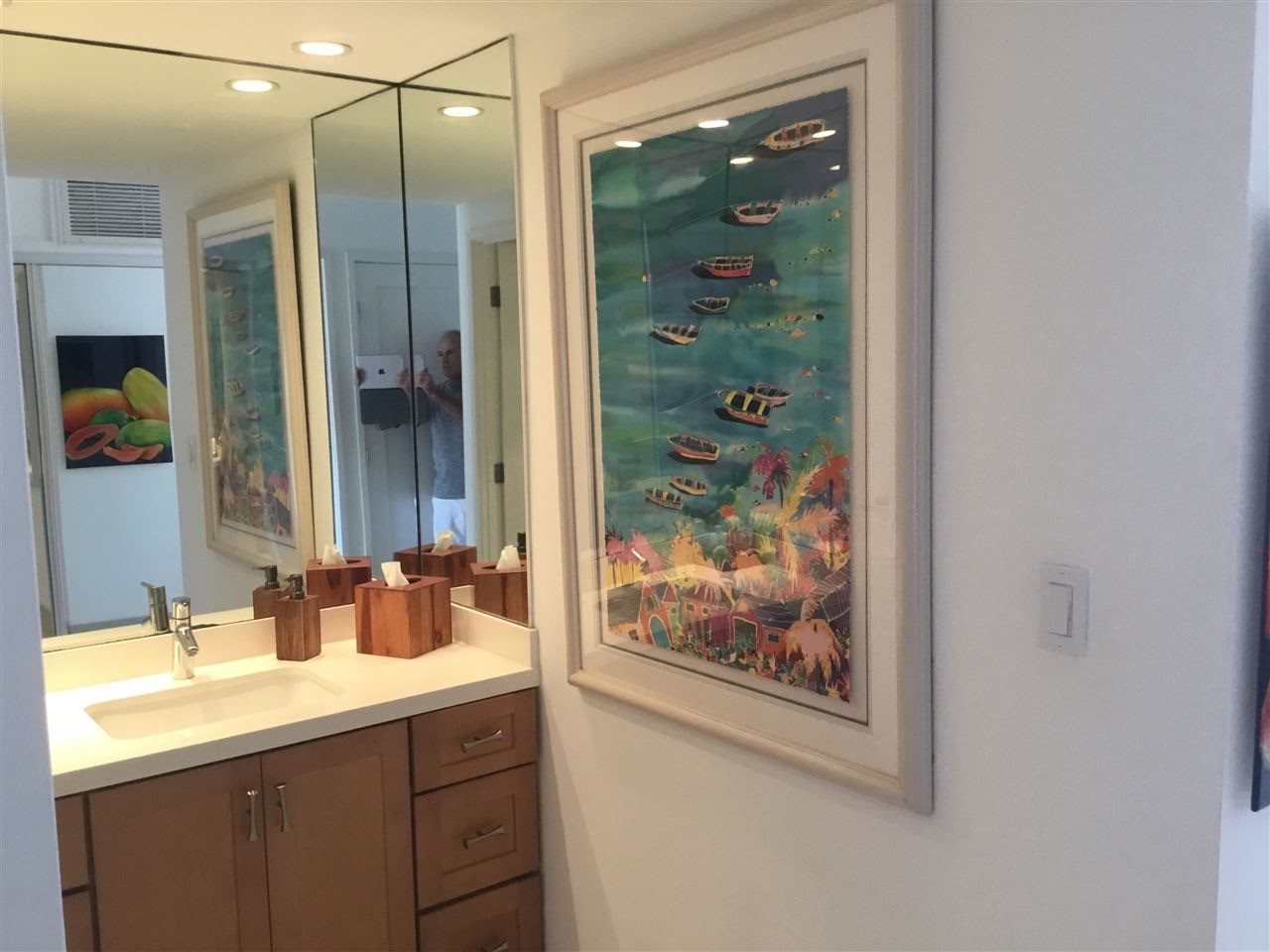 475 Front Street, Unit 624 Lahaina, HI 96761 - Photo 9 of 17 a bathroom with a sink and a mirror