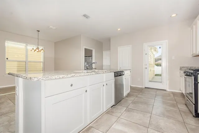 a bathroom with a sink double vanity and a mirror