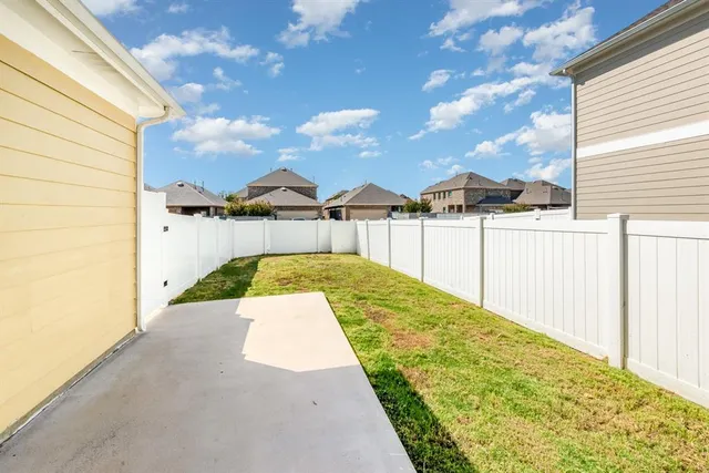 a view of balcony with furniture