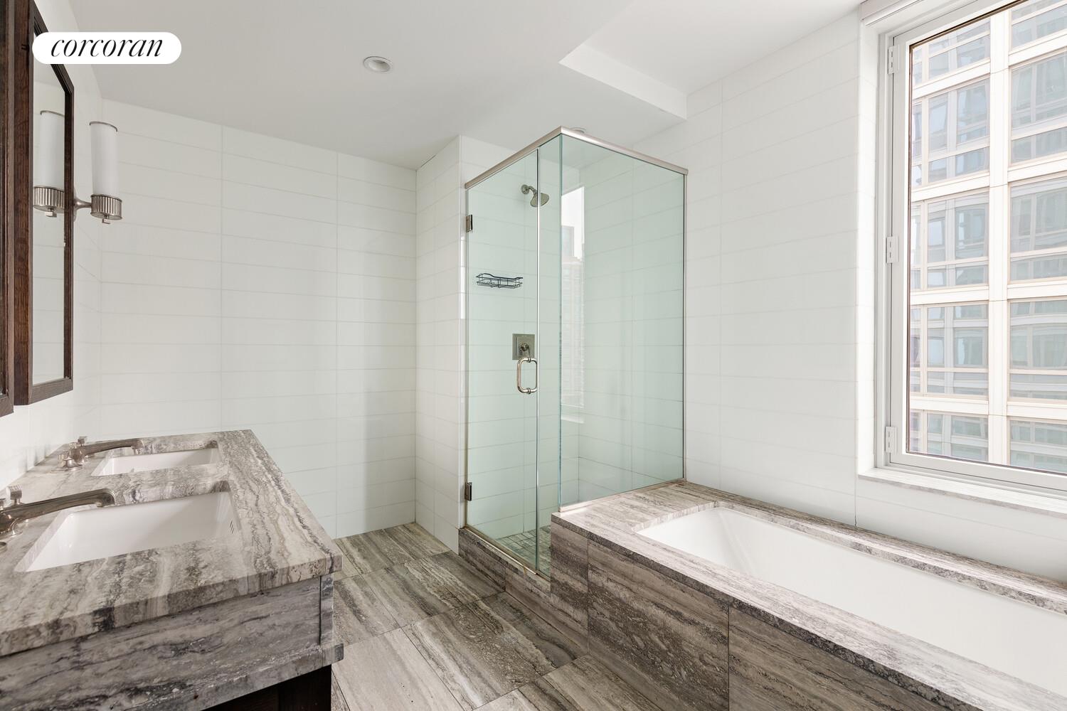 80 Riverside Boulevard, Unit 26C Manhattan, NY 10069 - Photo 6 of 6 a bedroom with a bed and a window
