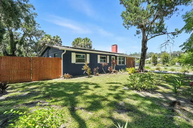 a view of a backyard with a garden