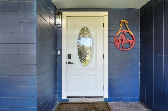 a view of entrance gate of a house