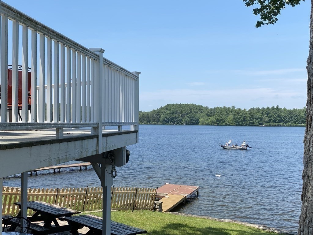 300 Killdeer Road Webster, MA 01570 - Photo 12 of 42 a view of a lake from a balcony