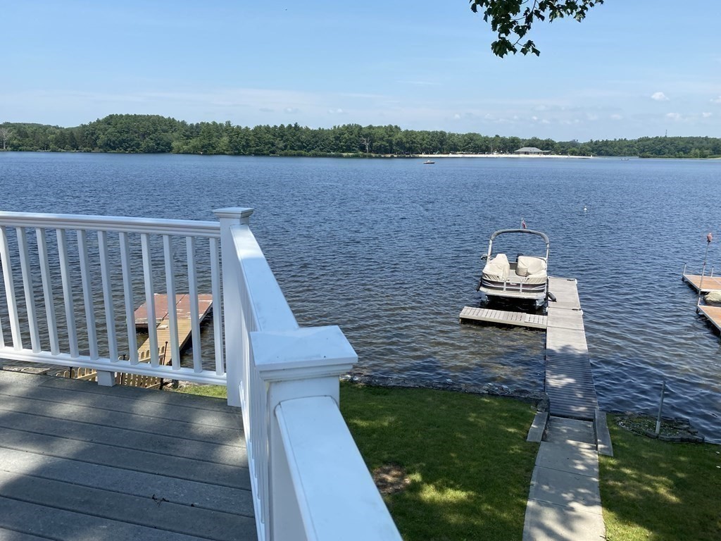 300 Killdeer Road Webster, MA 01570 - Photo 2 of 42 a view of a lake with a terrace