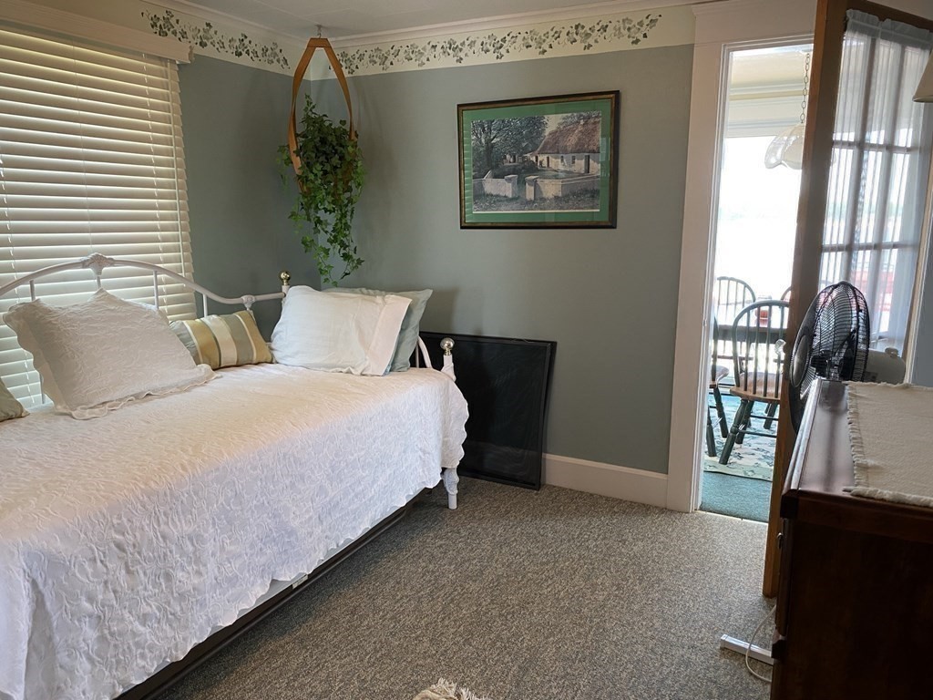 300 Killdeer Road Webster, MA 01570 - Photo 38 of 42 a bedroom with bed and a window