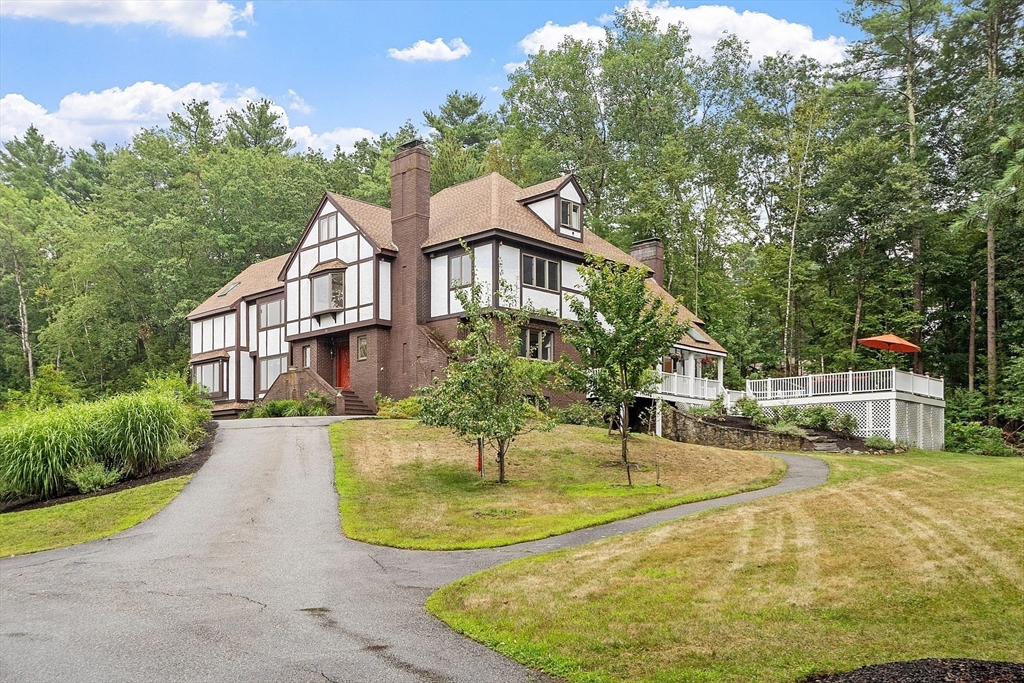 34 Wildmeadow Road Boxford, MA 01921 - Photo 2 of 40 a view of a house with a swimming pool