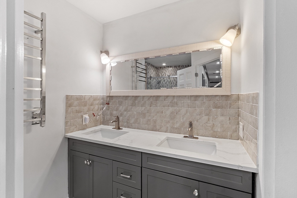 34 Wildmeadow Road Boxford, MA 01921 - Photo 35 of 40 a bathroom with a sink and a mirror