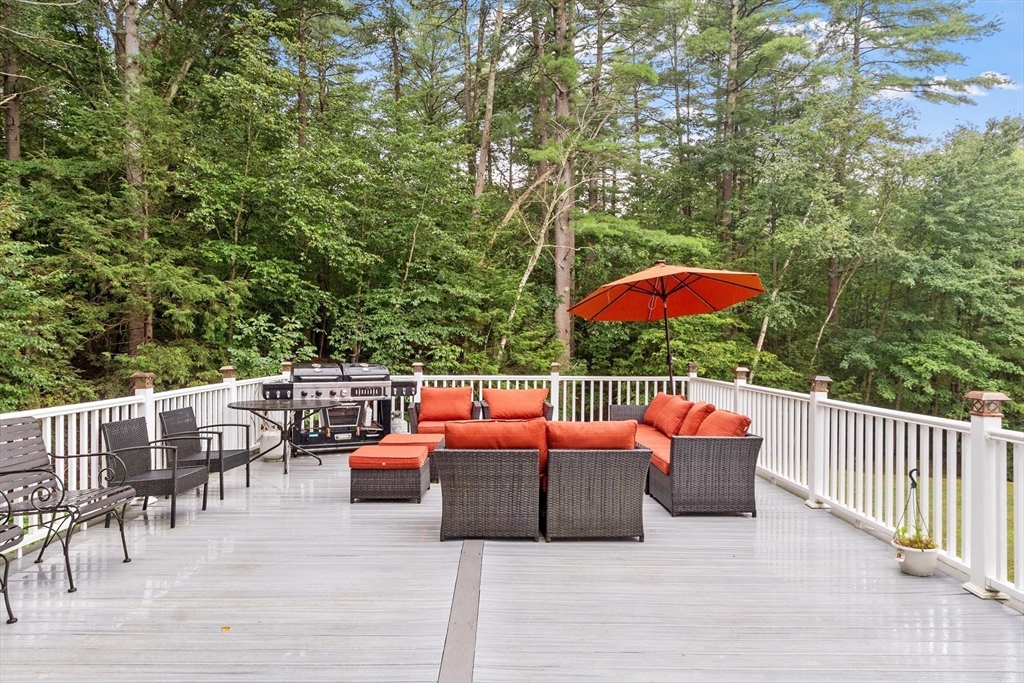 34 Wildmeadow Road Boxford, MA 01921 - Photo 37 of 40 an outdoor sitting area with furniture and wooden floor