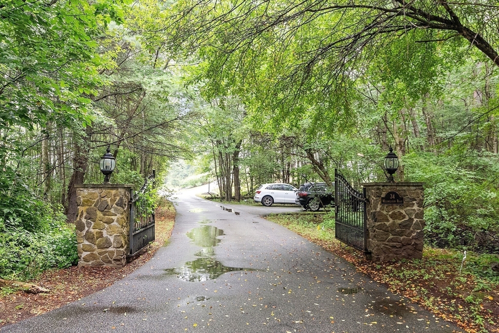 34 Wildmeadow Road Boxford, MA 01921 - Photo 4 of 40 a view of a yard with large trees