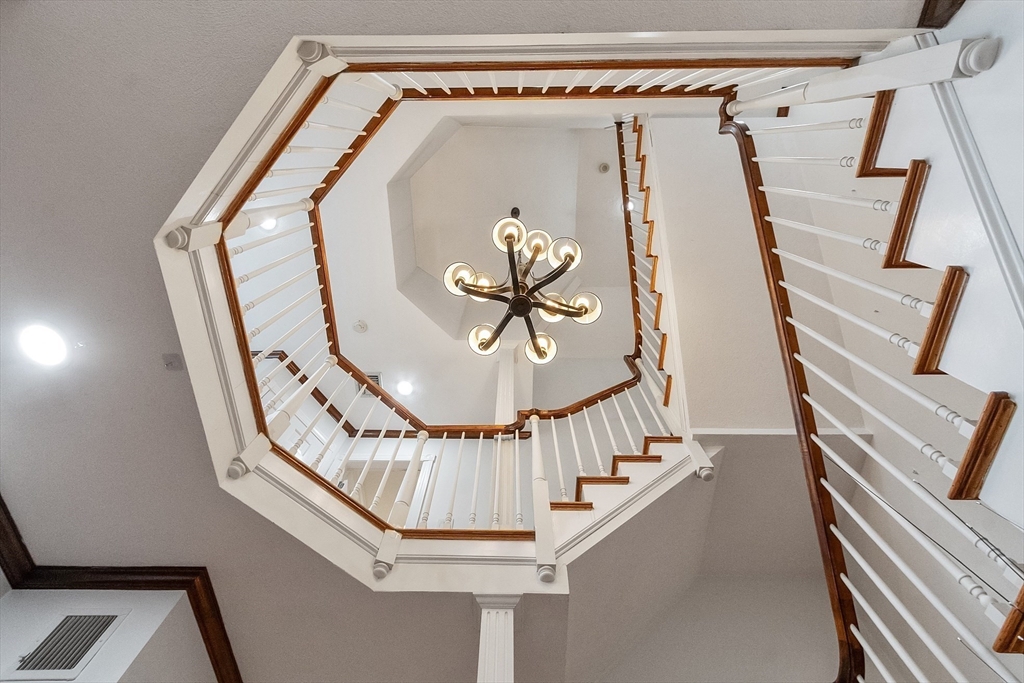34 Wildmeadow Road Boxford, MA 01921 - Photo 5 of 40 a view of staircase with railing and white walls
