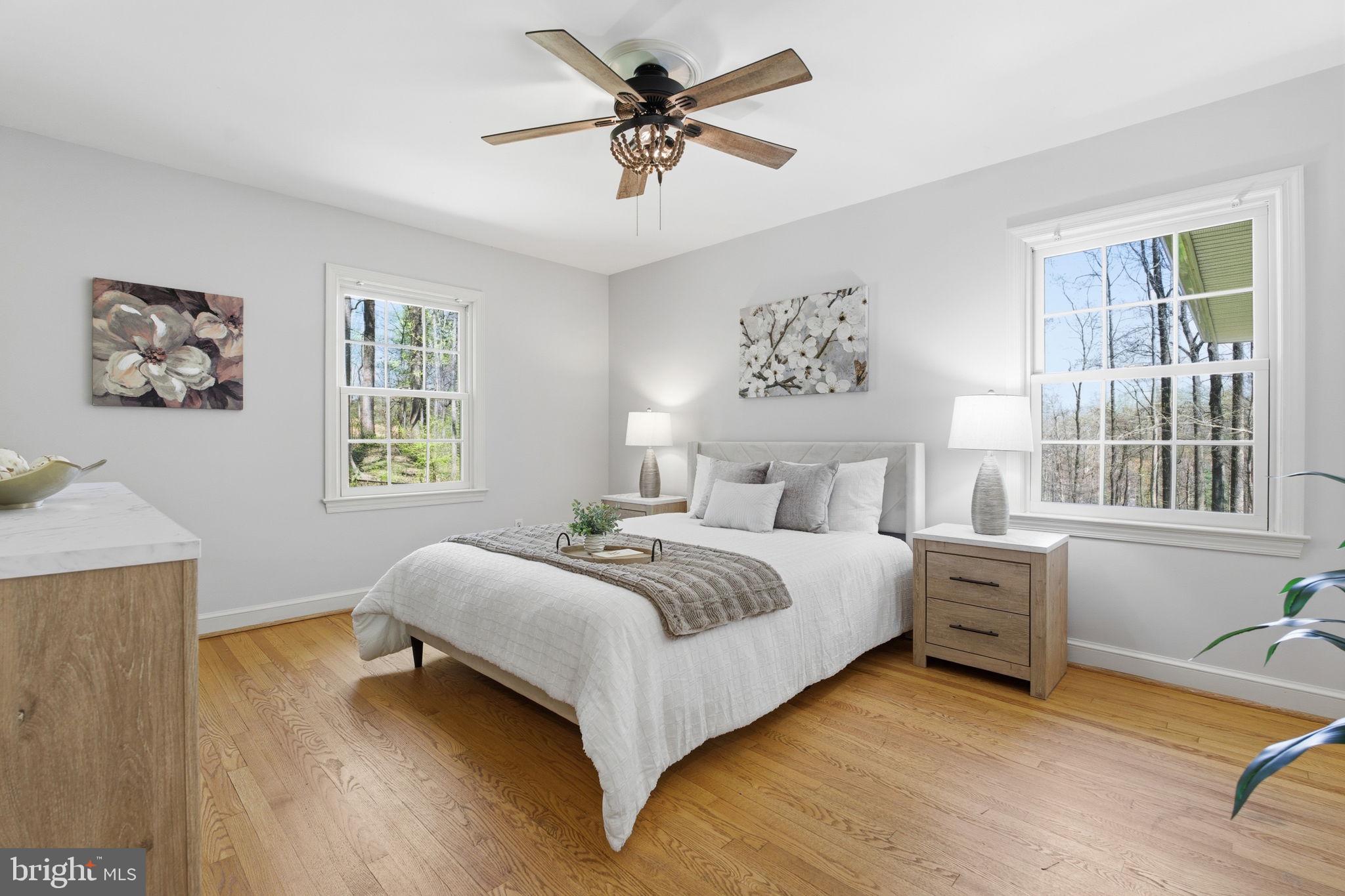 22 Brinkwood Road Brookeville, MD 20833 - Photo 16 of 36 a bedroom with a bed and a window