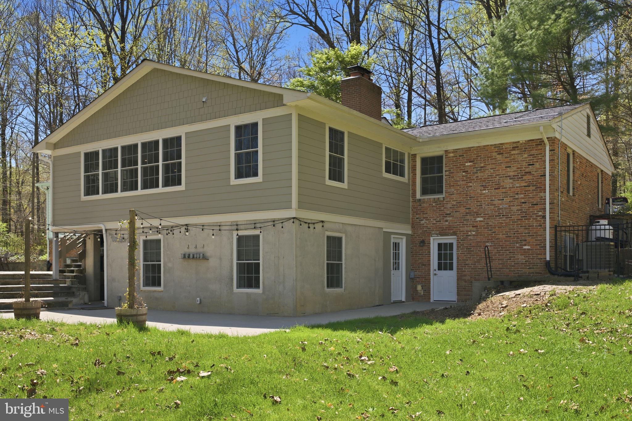 22 Brinkwood Road Brookeville, MD 20833 - Photo 35 of 36 a view of front of a house with a yard