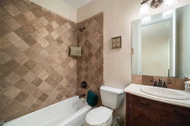 a view of a yard with wooden fence