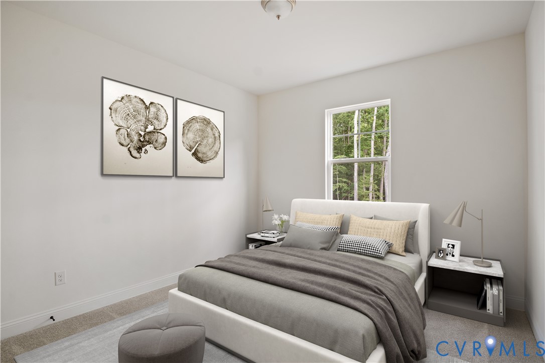 4648 McGhee House Road Mechanicsville, VA 23111 - Photo 17 of 39 a bedroom with a bed and painting on the wall