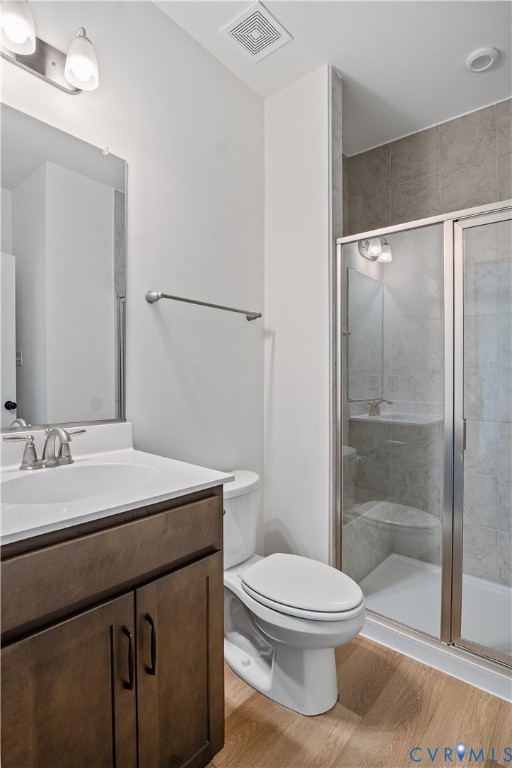 4648 McGhee House Road Mechanicsville, VA 23111 - Photo 19 of 39 a bathroom with a sink a toilet and shower