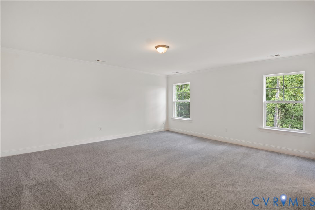 4648 McGhee House Road Mechanicsville, VA 23111 - Photo 23 of 39 an empty room with windows