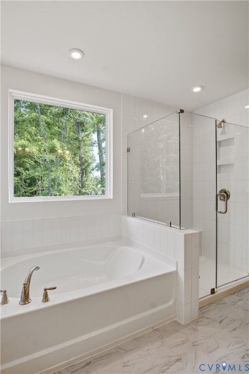 4648 McGhee House Road Mechanicsville, VA 23111 - Photo 26 of 39 a bathroom with a bathtub and a shower