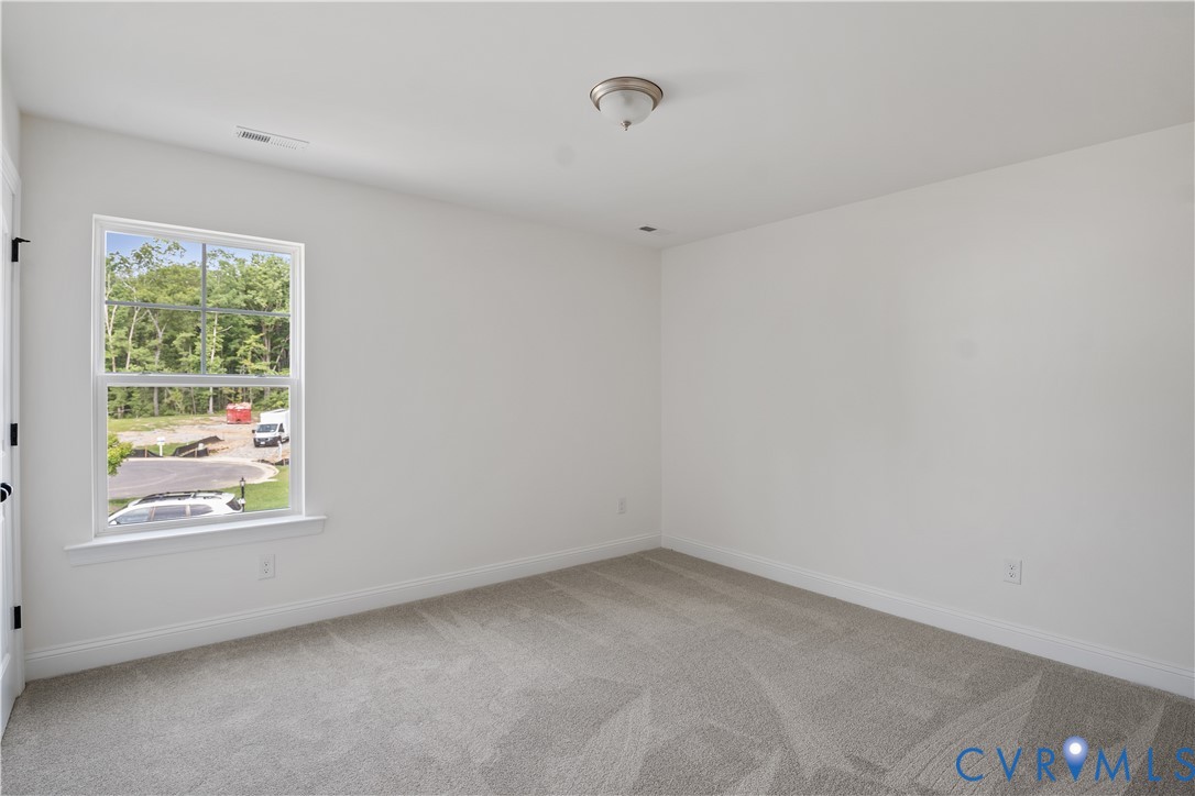 4648 McGhee House Road Mechanicsville, VA 23111 - Photo 31 of 39 an empty room with a window