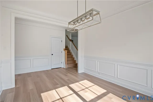 a kitchen with a stove a sink and a refrigerator