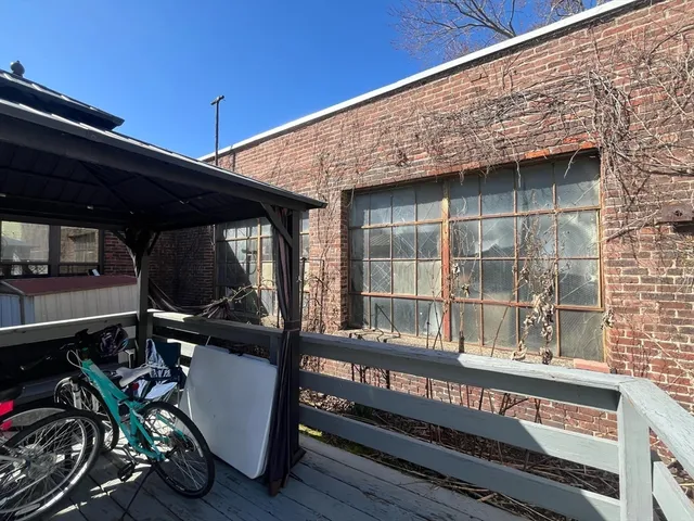 a view of a porch with furniture