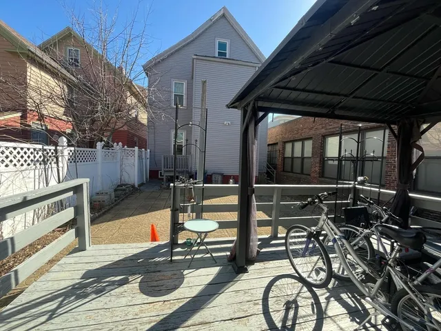 a view of chairs and tables in the patio