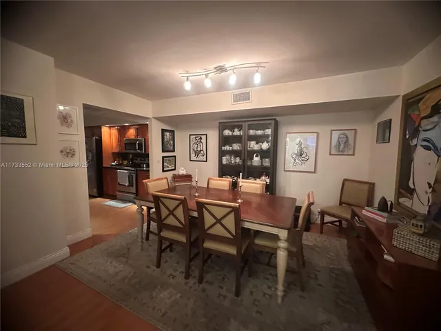 a view of a dining room with furniture