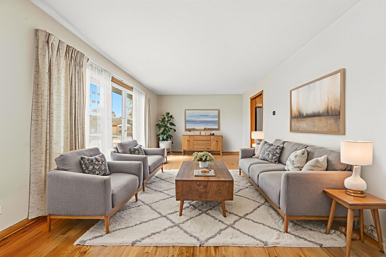 22 Charing Cross Road Chicago Heights, IL 60411 - Photo 12 of 25 a living room with furniture and a large window