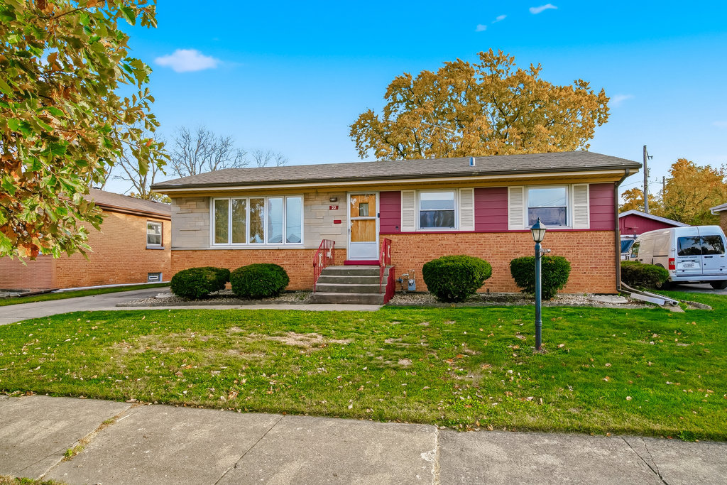 22 Charing Cross Road Chicago Heights, IL 60411 - Photo 2 of 25 front view of a house with a yard