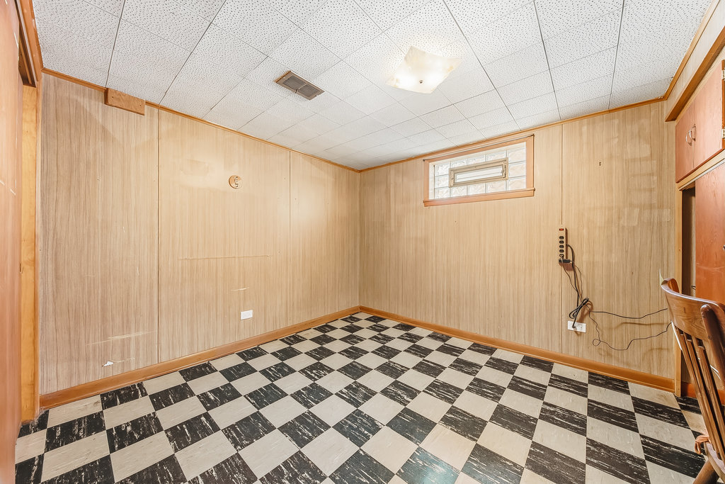 22 Charing Cross Road Chicago Heights, IL 60411 - Photo 24 of 25 a bedroom with a black and white checkered floor