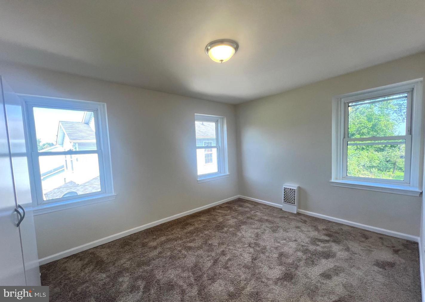 617 3rd Street Beverly, NJ 08010 - Photo 13 of 16 a view of an empty room with a window