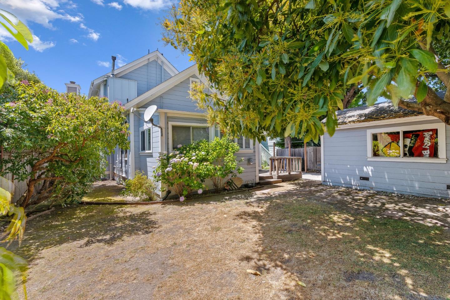 514 Washington Street Santa Cruz, CA 95060 - Photo 8 of 25 a view of a house with a tree and plants