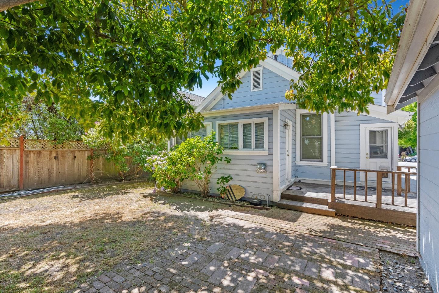 514 Washington Street Santa Cruz, CA 95060 - Photo 9 of 25 a view of a house with a yard and large tree