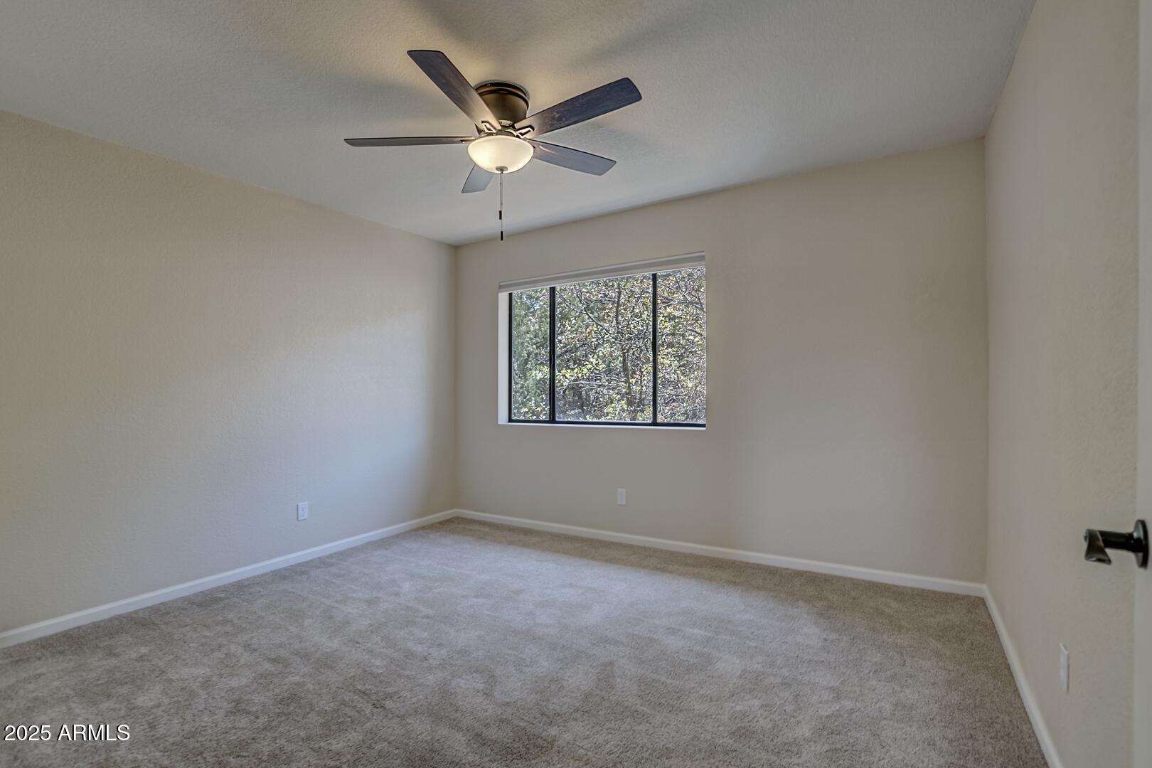 938 West Madera Lane Payson, AZ 85541 - Photo 18 of 28 an empty room with a window