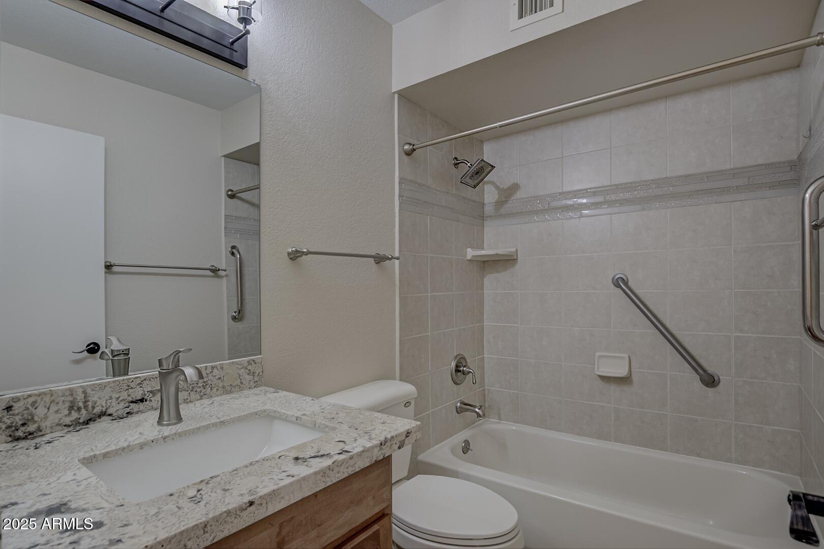 938 West Madera Lane Payson, AZ 85541 - Photo 19 of 28 a bathroom with a granite countertop sink toilet and shower
