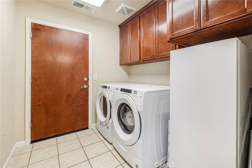 23446 Capay Road Corning, CA 96021 - Photo 35 of 64 a utility room with dryer and washer