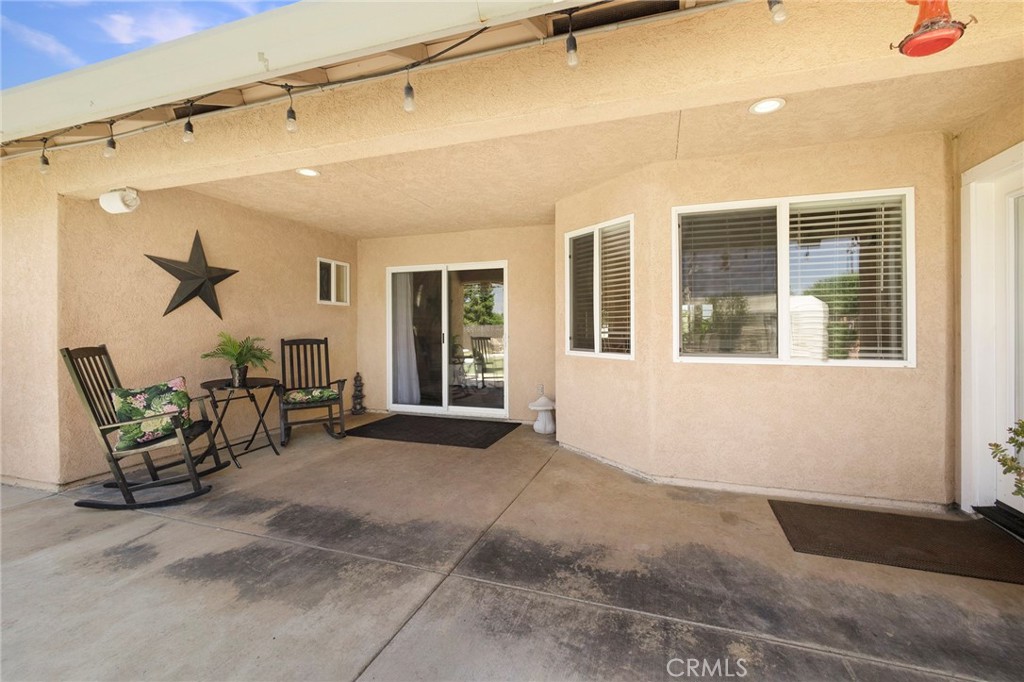 23446 Capay Road Corning, CA 96021 - Photo 40 of 64 a view of a room with furniture and windows