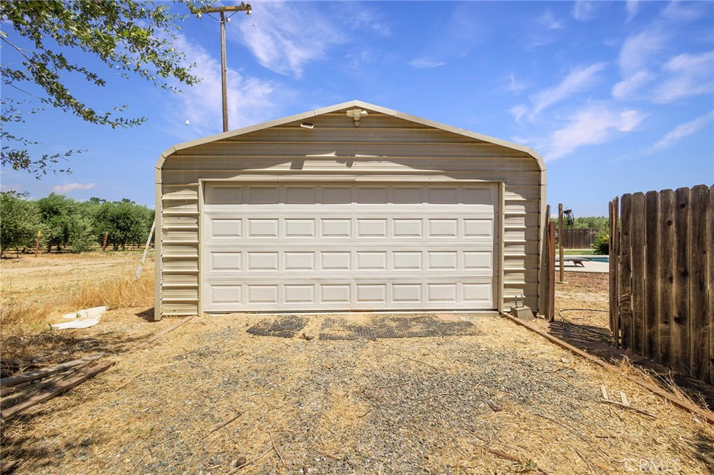 23446 Capay Road Corning, CA 96021 - Photo 47 of 64 a front view of a house with a outdoor space
